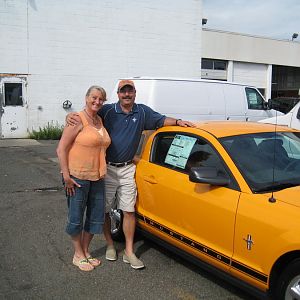 Frank & Donna picking up Grabber Orange Mustang at Sayville Ford (Aug. 2008)