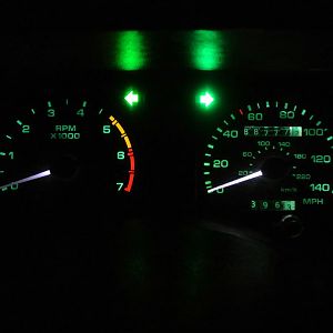 LEDs are a LOT brighter and make Gauges readable.  Check out the Green LEDs for the Hazard Lights. BRIGHT!