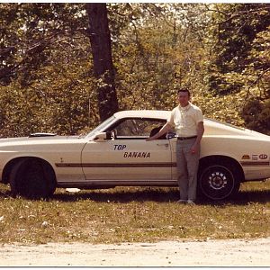 My father with his 1969 428 Cobra Jet Mach 1, circa 1972, a very frequent class winner and top eliminator in stock class at NY National Speedway in ea