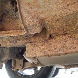 Hard to believe for some... but it's not rusted through. The Tech at Goodyear Tire and Ithaca complained of the rust. I have worked on way worse. I th
