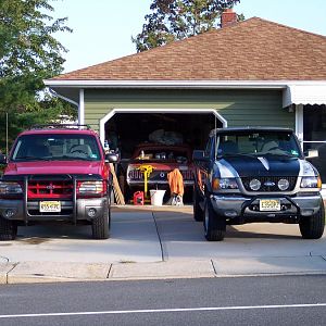 8/26/18 My 2000 Ranger 4x4, my wife's 99 Explorer Sport, & my 69 Mustang in the garage.