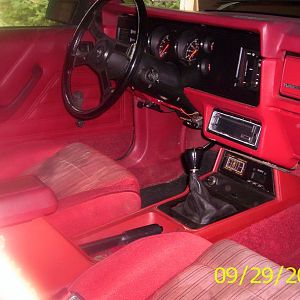 The interior before the new seats . but already with a new B&M short shifter and a leather bound Mustang gear shift knob.