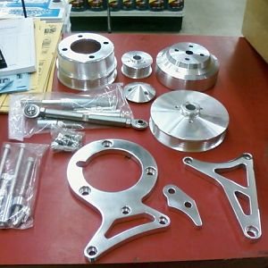 Polished aluminum underdrive pulley set with billet tensioning rod... :)