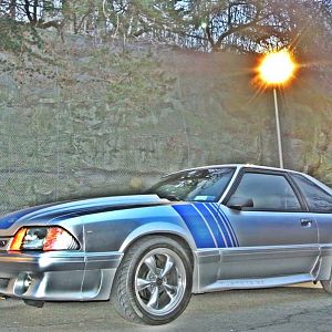 Silver Mustang Under Light