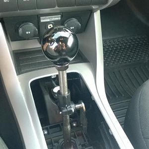 New Steeda short shifter in with a Blox Racing 490 weighted shift knob. Last piece of the puzzle is the custom Redline shift boot. :D