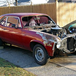 christmas day, 2008. my gift to myself, a 72 nova, saved from scrap. was an old race car that caught fire and wrecked at the track. this is how i got